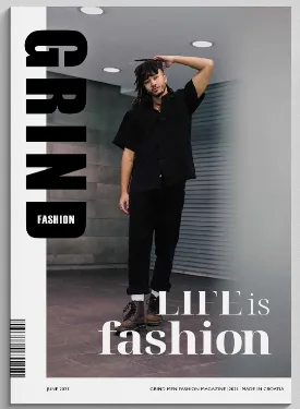 Cover: model in black in a corridor, headline Life is fashion